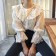 韓國東大門韓國首爾熱賣款減齡白色翻領摟空微透膚蕾絲喇叭彈性袖口甜美上衣 